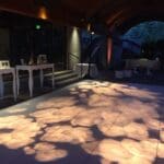 Wedding reception at Domaine Chandon with a rose floral pattern wash over dance floor.